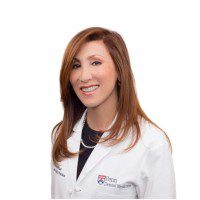 Smiling female physician